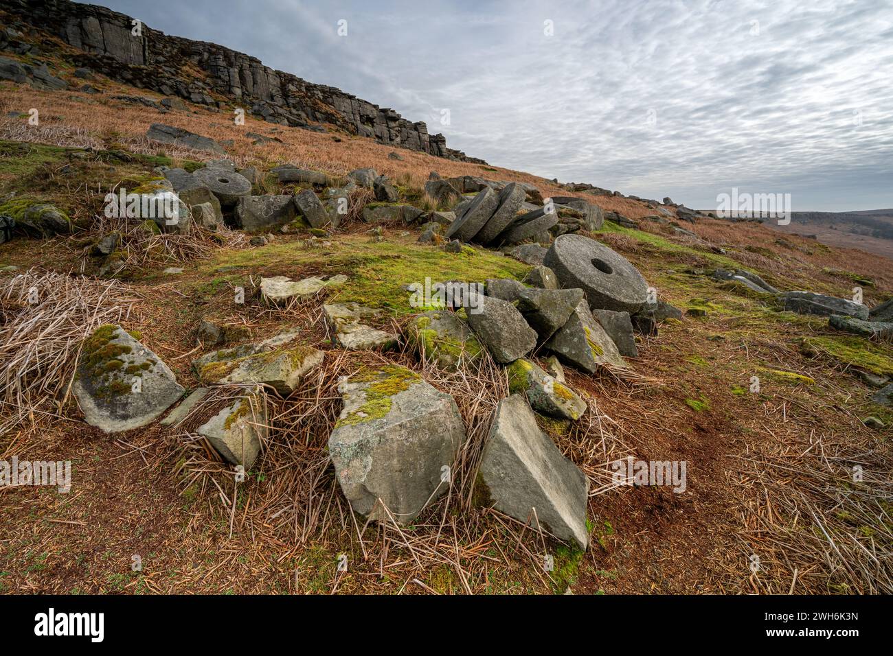 Stanage Edge millstones in the Derbyshire Peak District National Park during winter. Stock Photo