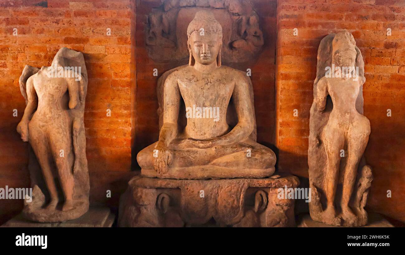Carving Sculpture of Lord Buddha and Disciples in Teevardeo Buddhist Monastery, Sirpur, Mahasamund, Chhattisgarh, India. Stock Photo