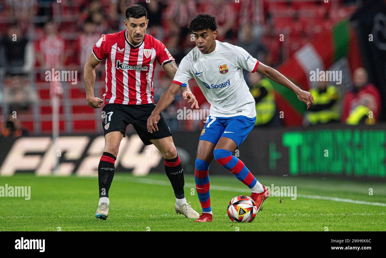 Yuri Berchiche of Athletic Club and Lamine Yamal of FC Barcelona in action during the Copa del Rey Quarter Final match between Athletic Club and FC Barcelona at San Mames Stadium on January 24, 2024 in Bilbao, Spain. Photo by Victor Fraile / Power Sport Images Stock Photo