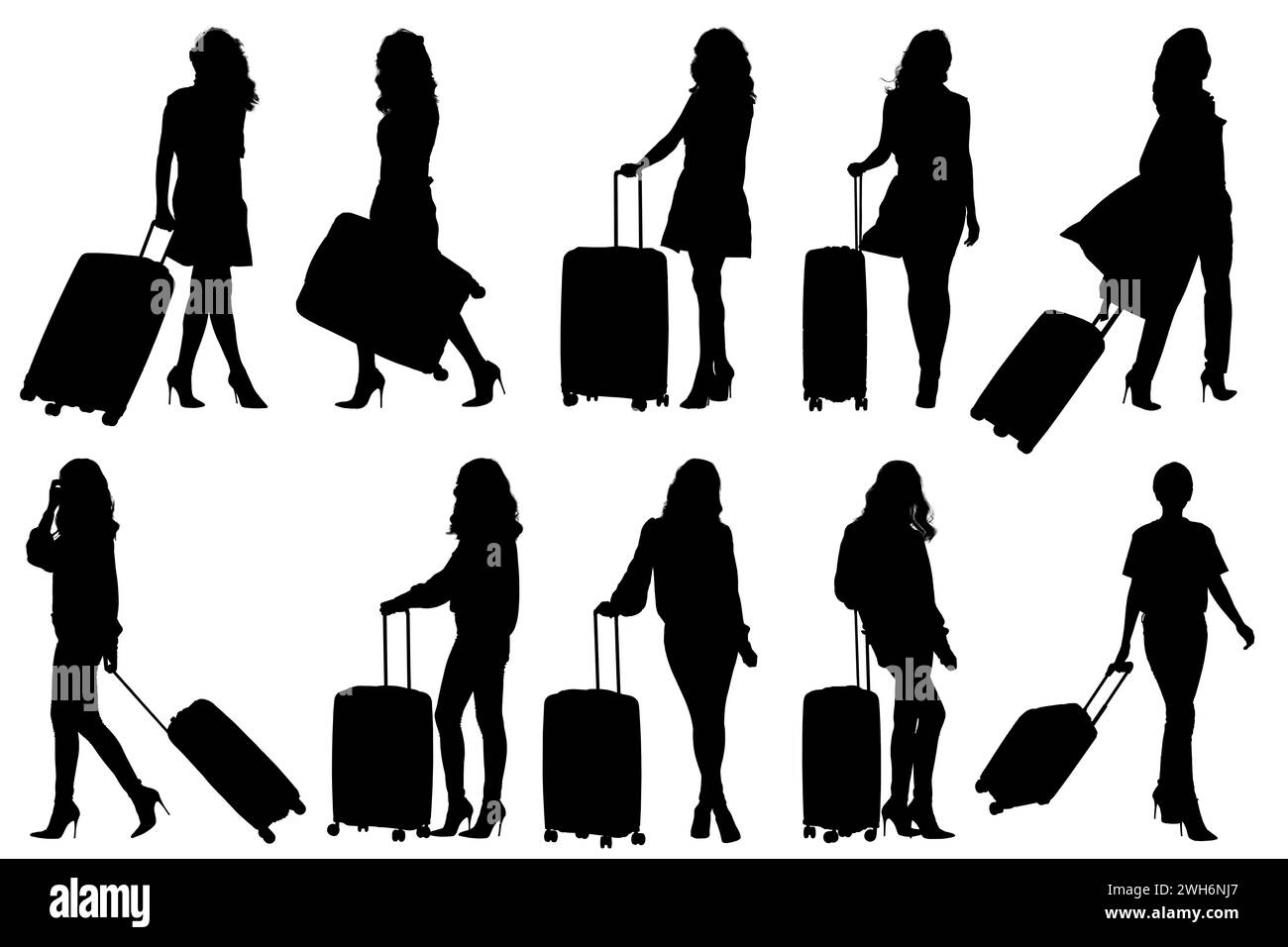 Silhouettes of young woman traveler walking with suitcase Stock Photo
