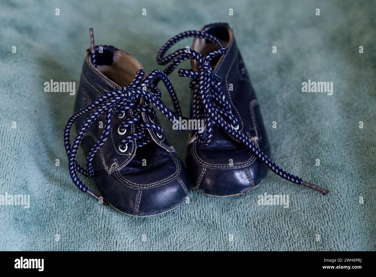 Navy blue vinage baby shoe Stock Photo