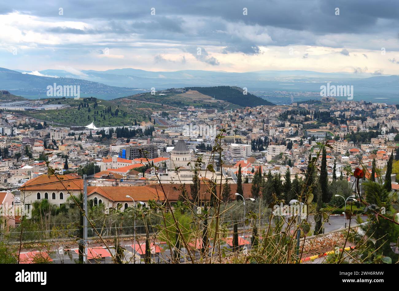 An areal View of Nazareth city center and Mount Kedumim ( Mount Precipice) in the background Stock Photo