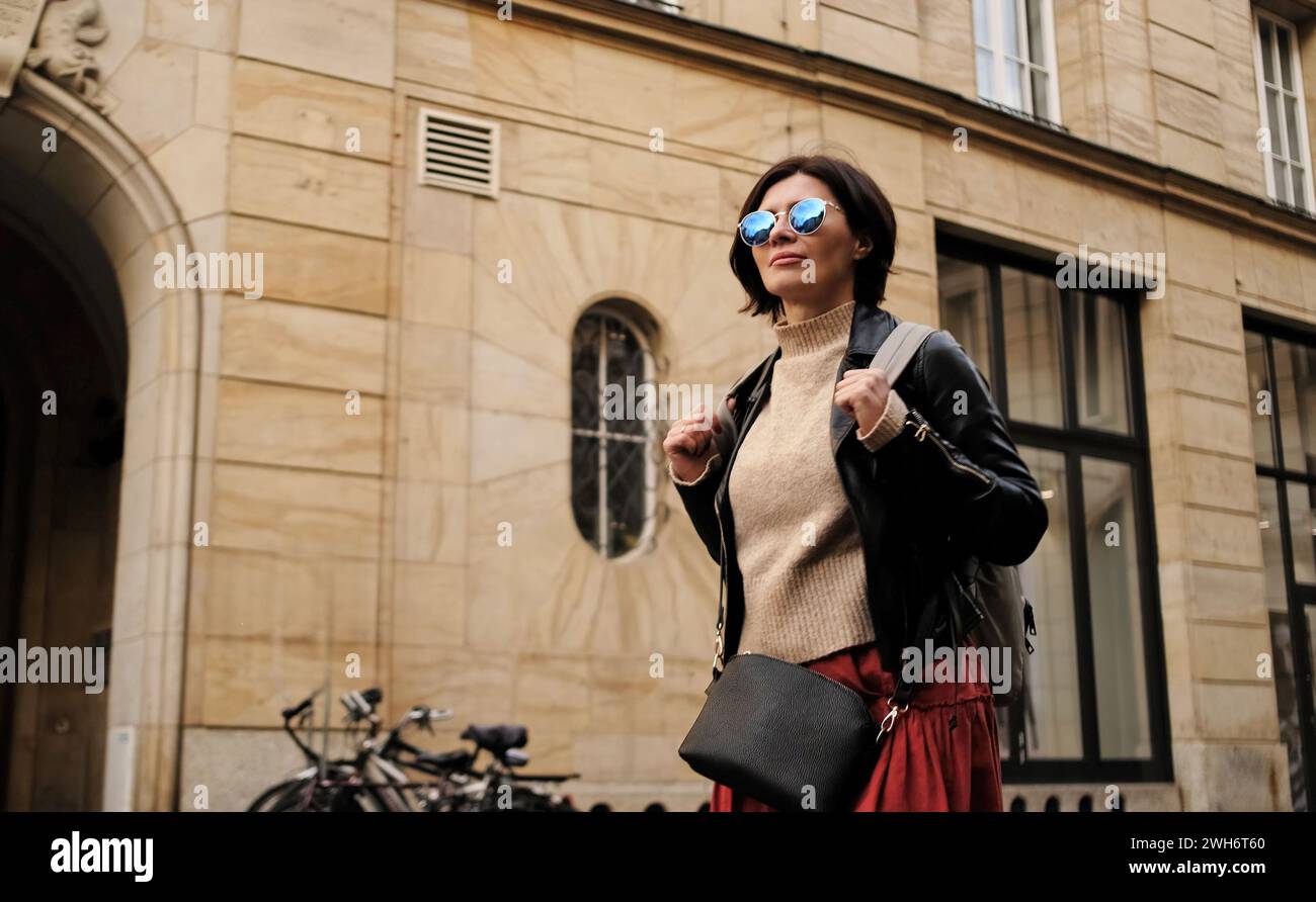Stylish tourist woman walking hi-res stock photography and images - Alamy