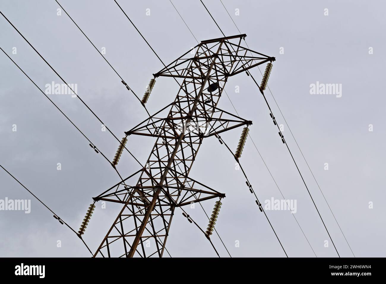 Metal tower with high voltage wires Stock Photo - Alamy
