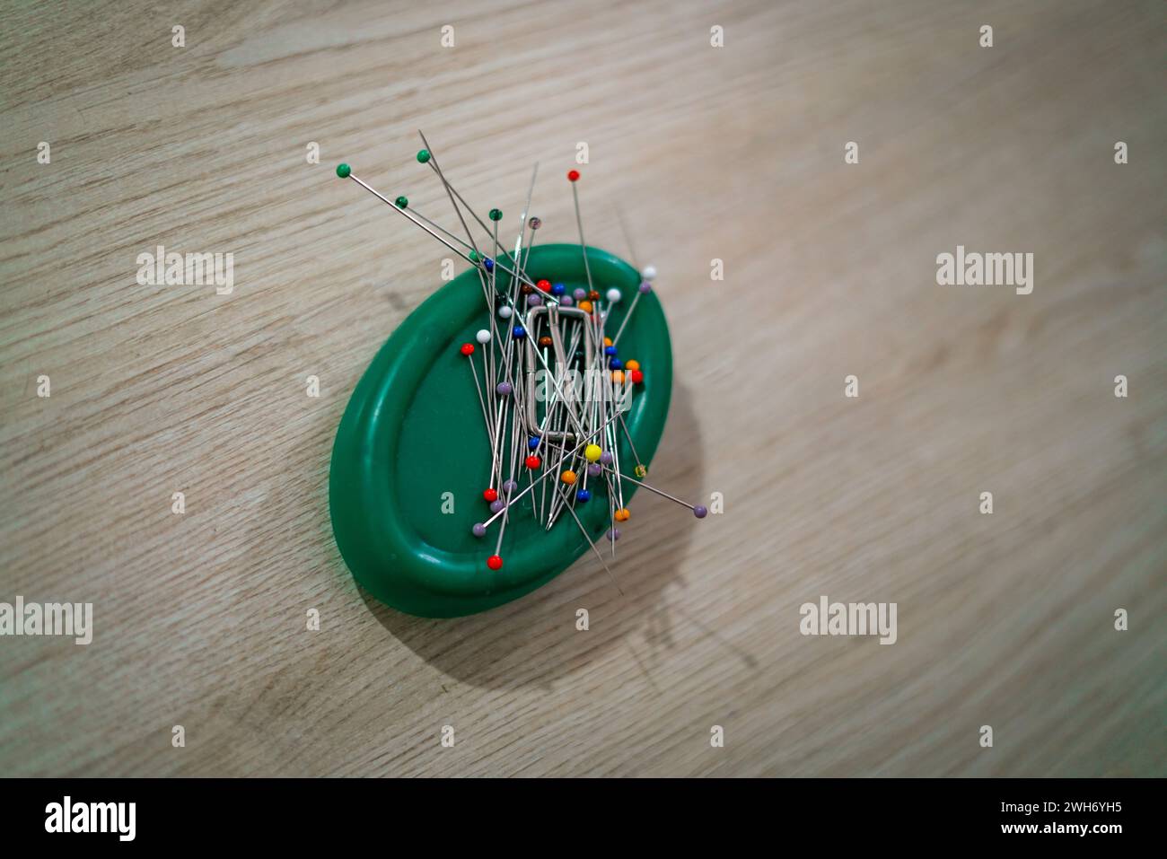 Colorful pins in the sewing studio Stock Photo - Alamy