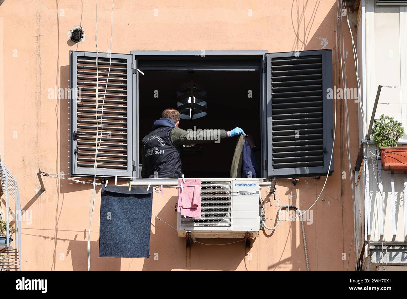 08th Feb 2024, Naples, Italy. A man of scientific police in the apartment where a man first killed his wife, then shot from the window at the police, and then committed suicide, in the San Giovanni a Teduccio neighborhood in Naples. Credit: Marco Cantile/Alamy Live News Stock Photo