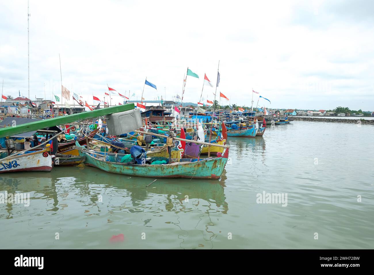 Lampung, Indonesia, 07 October 2022: Fishing boat on the beach, this boat is used as a small crab fishing boat by local Indonesian fishermen. parked o Stock Photo