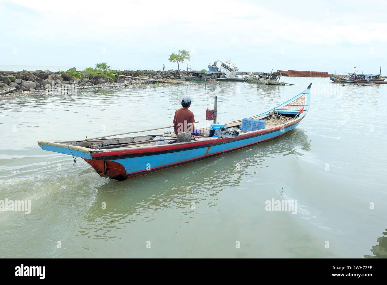 Lampung, Indonesia, 07 October 2022: A fishing boat cruises in the water, this boat is used as a fishing boat by local Indonesian fishermen. Fishing b Stock Photo