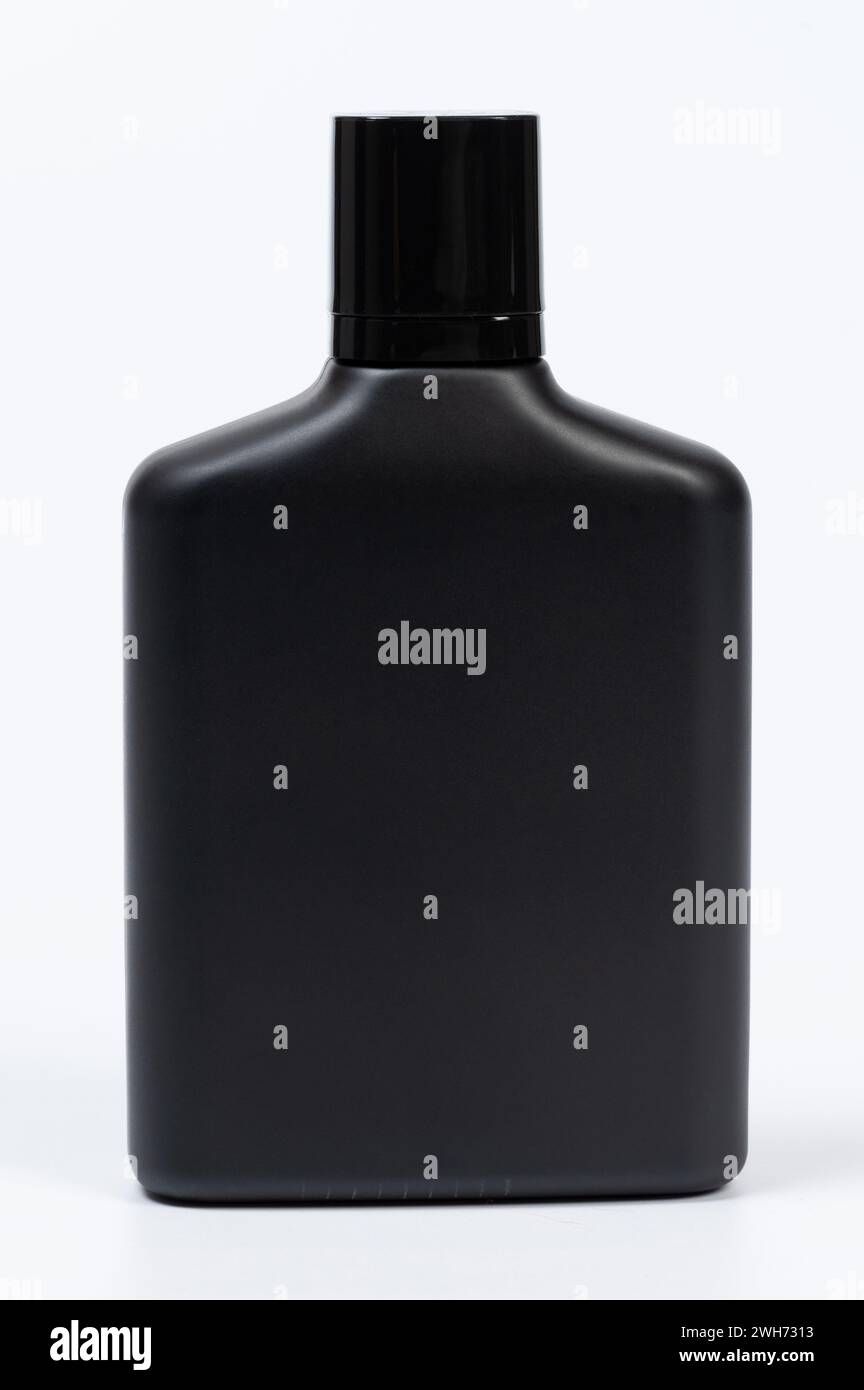 Generic black bottle perfume for men front view isolated on studio