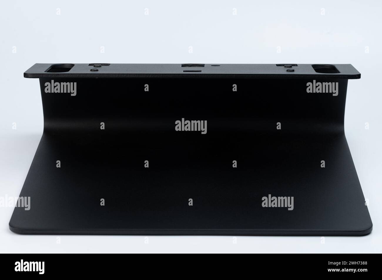 Metal black bracket for big tv panel isolated on white studio background Stock Photo