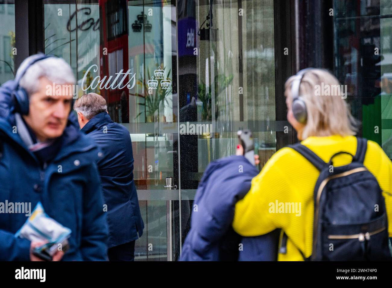 London, UK. 8 Feb 2024. People Protect Themselves From The Rain Wrapped ...