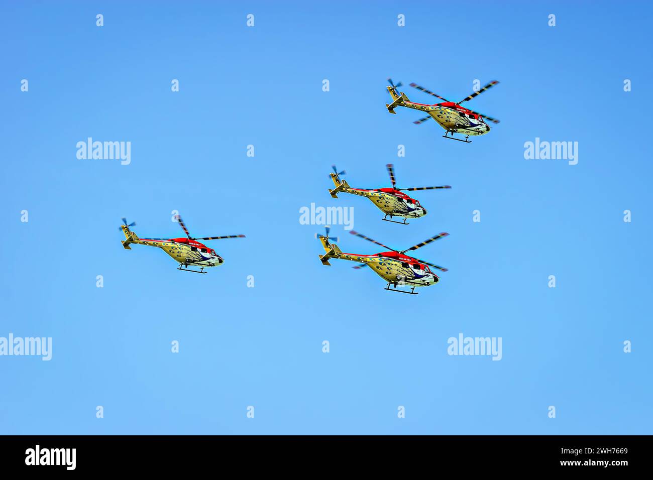 Indian Air Force's Sarang Helicopter DIsplay Team performing maneuvers
