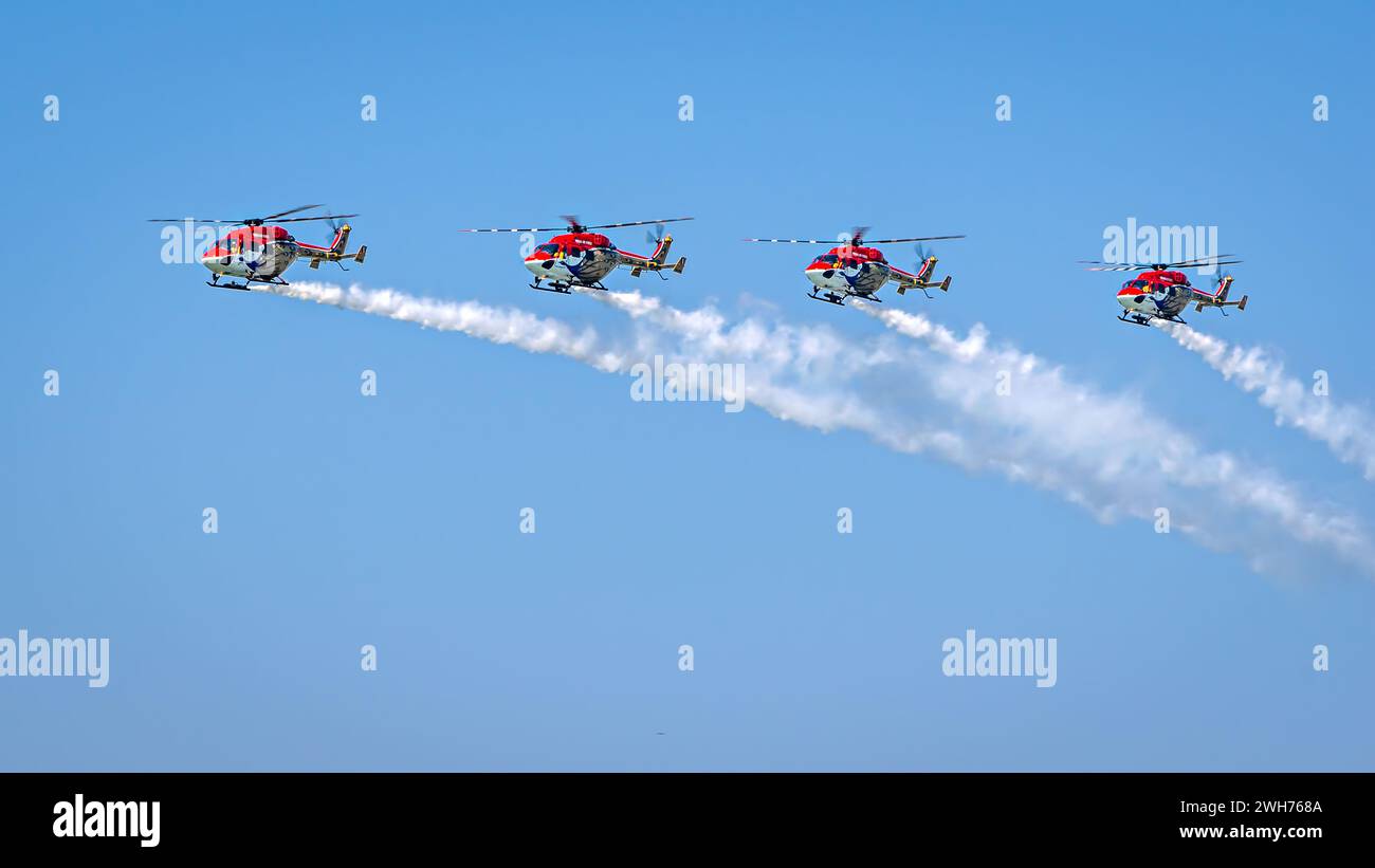 Indian Air Force's Sarang Helicopter DIsplay Team performing maneuvers