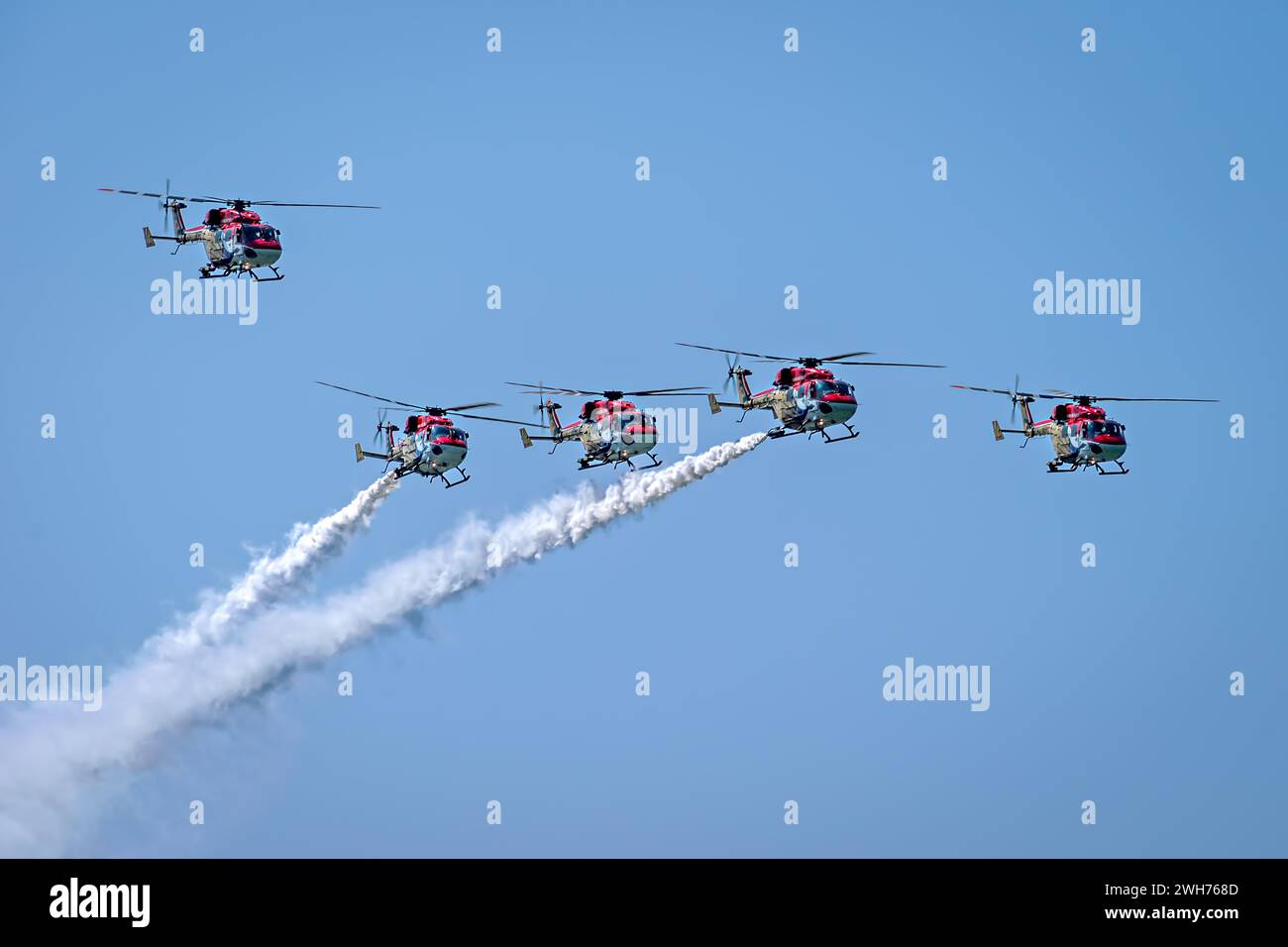 Indian Air Force's Sarang Helicopter DIsplay Team performing maneuvers
