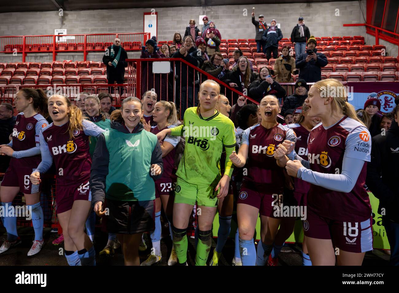 Crawley, UK. 7th February 2024.   Aston Villa WFC celebrate winning the match with fans at full time during The FA Women’s Continental Tyres League Cup Quarter Final match between Brighton & Hove Albion WFC and Aston Villa WFC at Broadfield Stadium in Crawley on 7th February 2024.   This image may only be used for Editorial purposes. Editorial use only.  Credit: Ashley Crowden/Alamy Live News Stock Photo