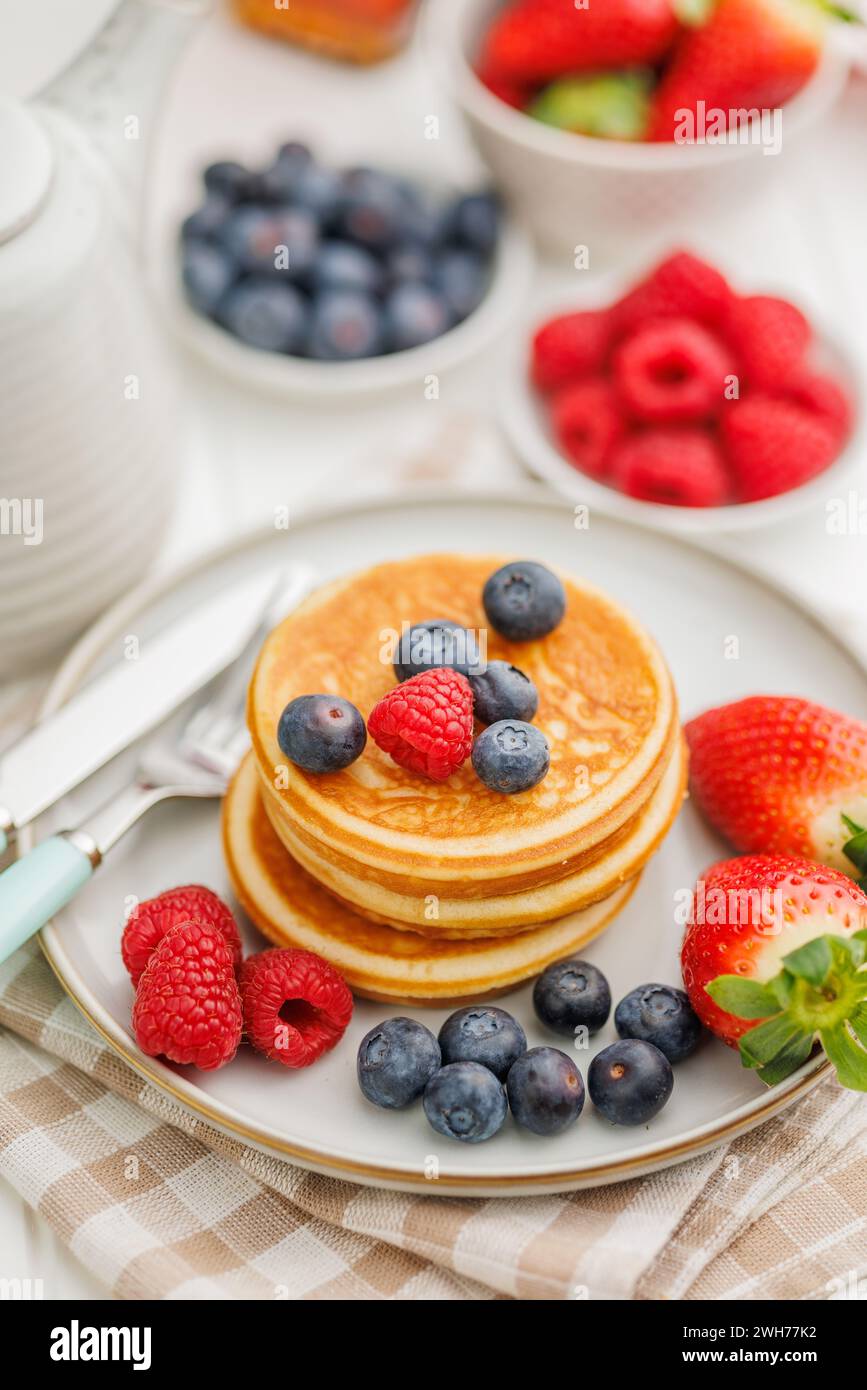The homemade classic american pancakes with blueberries, raspberries ...