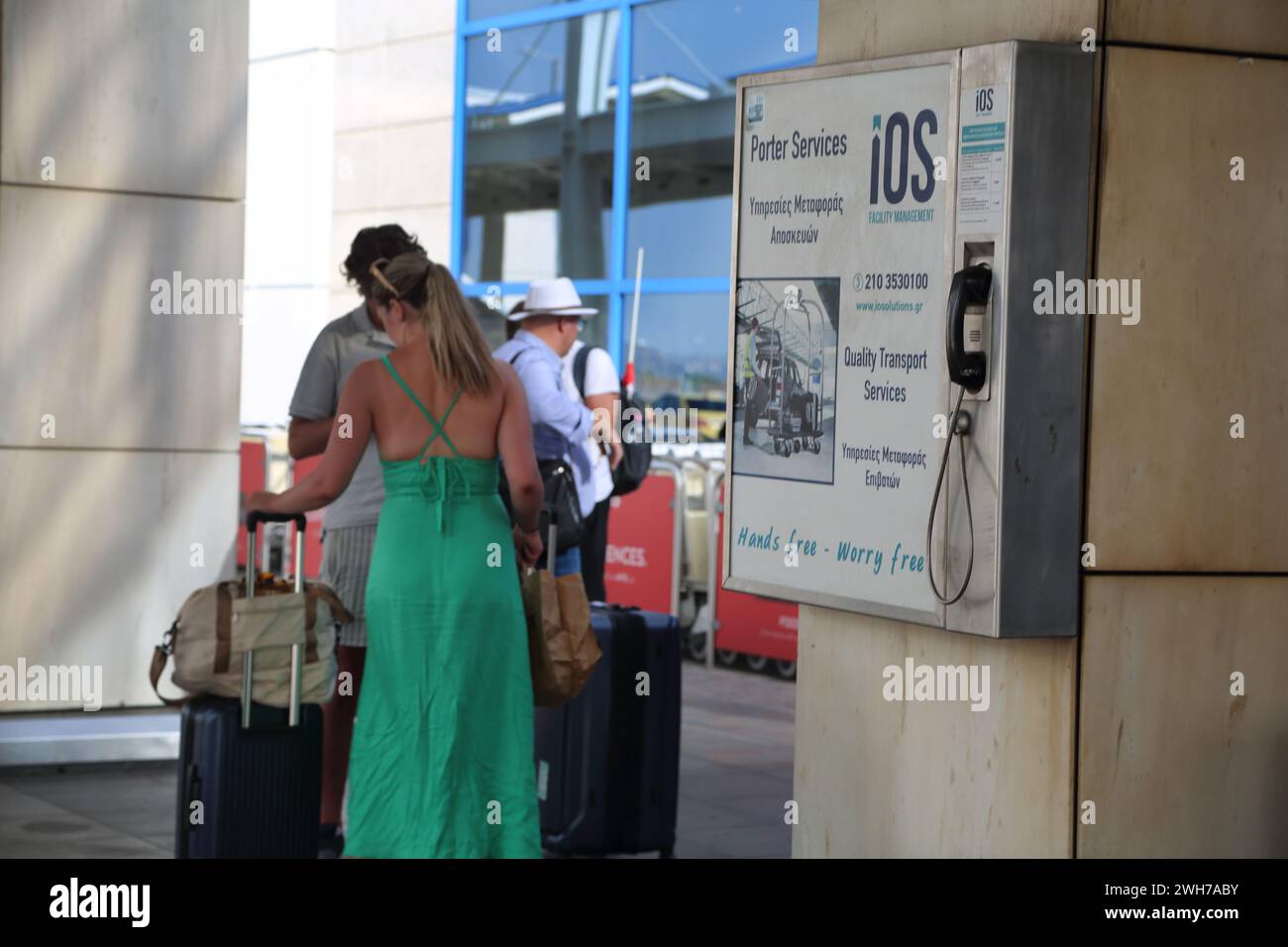 Athens Greece Athens International Airport (AIA) Eleftherios Venizelos Family outside Terminal Two with Luggage Stock Photo