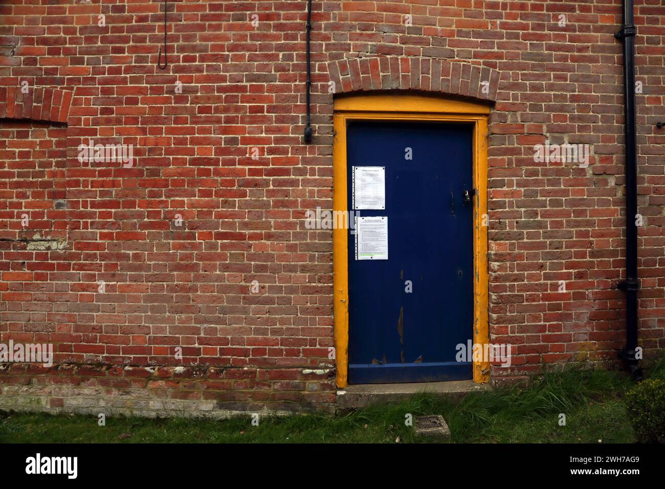 Friday Street on the North Slope of Leith Hill  Wotton Parish Counsel Notices on Blue Door Surrey England Stock Photo