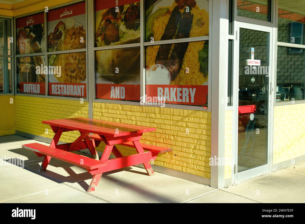 Red picnic table at Buffalo Bakery in Riverside, Buffalo, New York Stock Photo