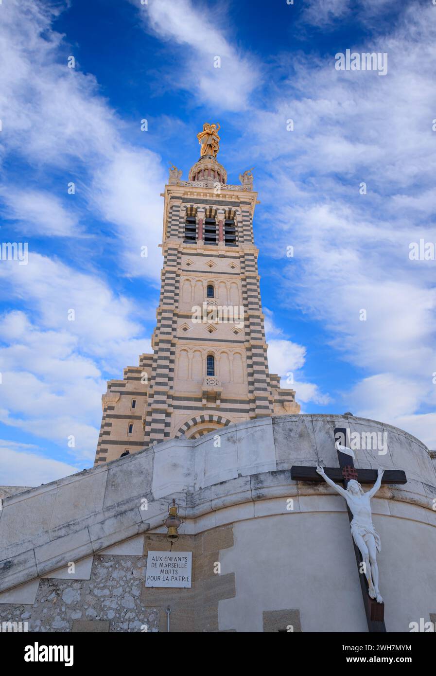 View of Notre Dame de la Garde in Marseille, France: detail of the bell tower surmounted by the statue of the Virgin with child. Stock Photo