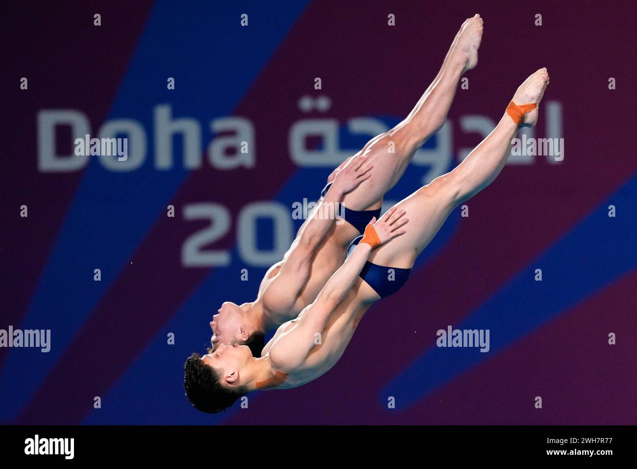 Che Won KO and Yong Myong IM of North Korea compete during the Men's