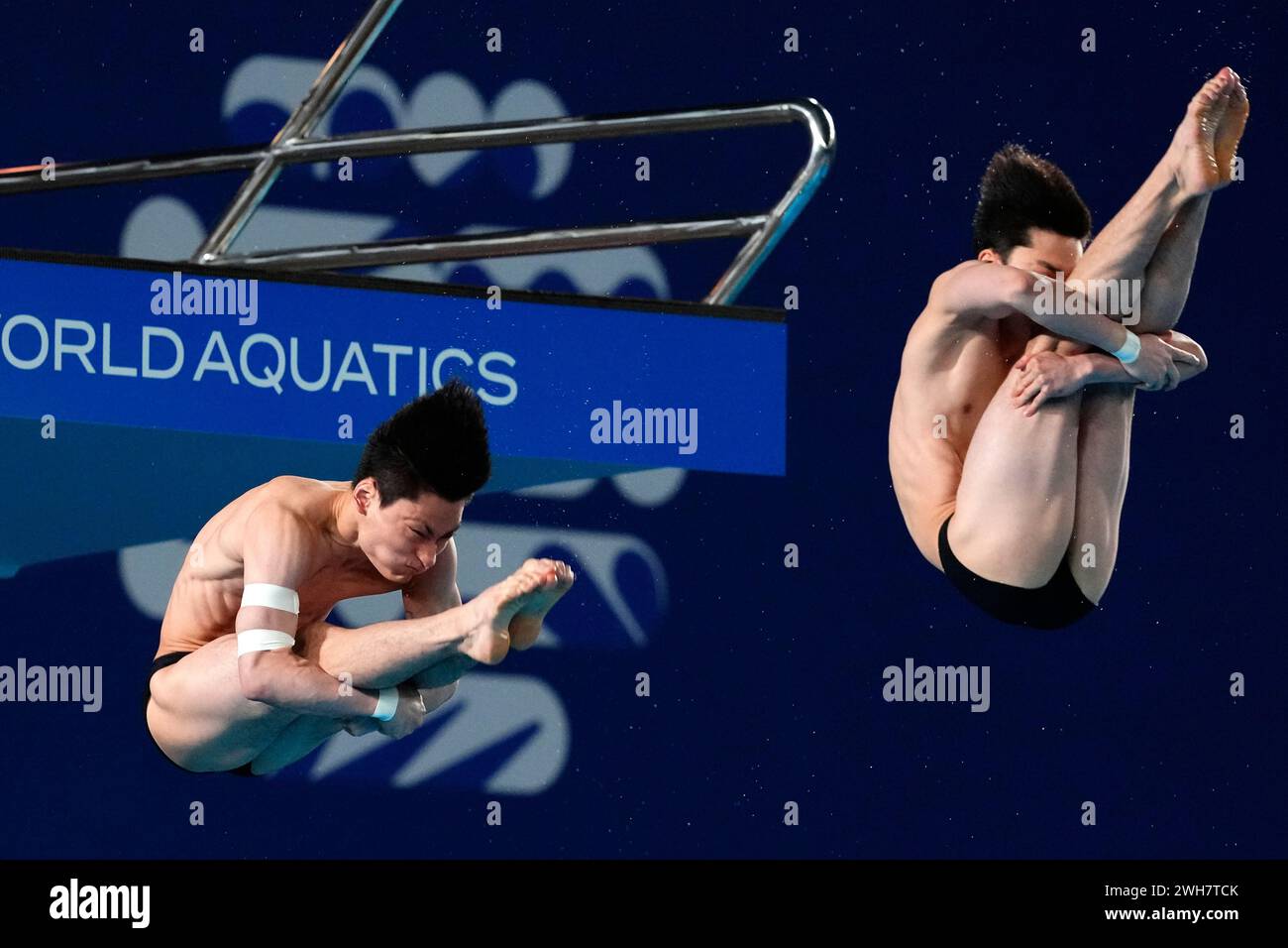Yeongtaek Kim and Shin Jungwhi of South Korea compete during the Men's