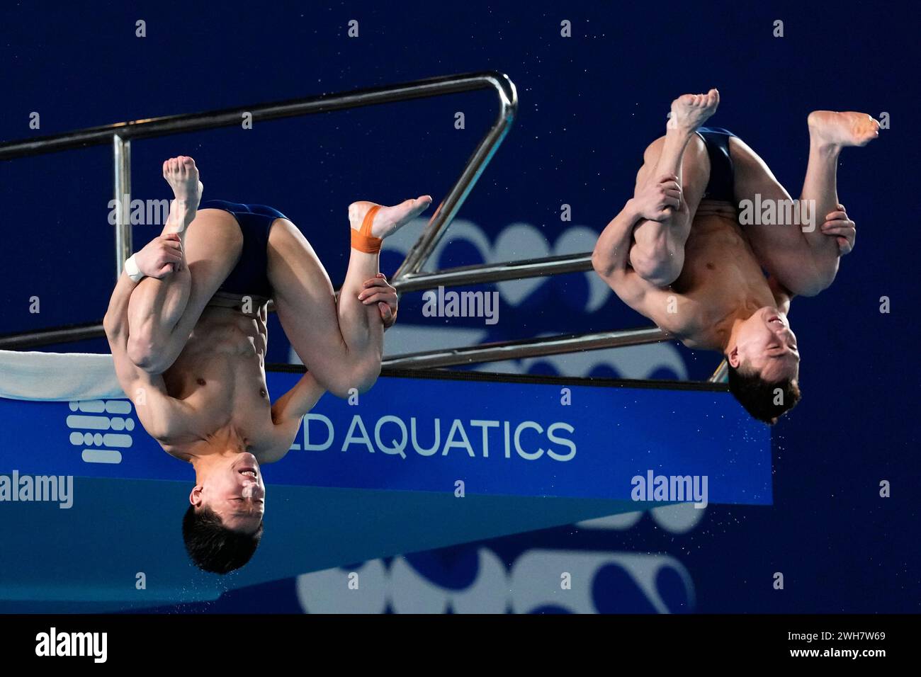 Che Won KO and Yong Myong IM of North Korea compete during the Men's