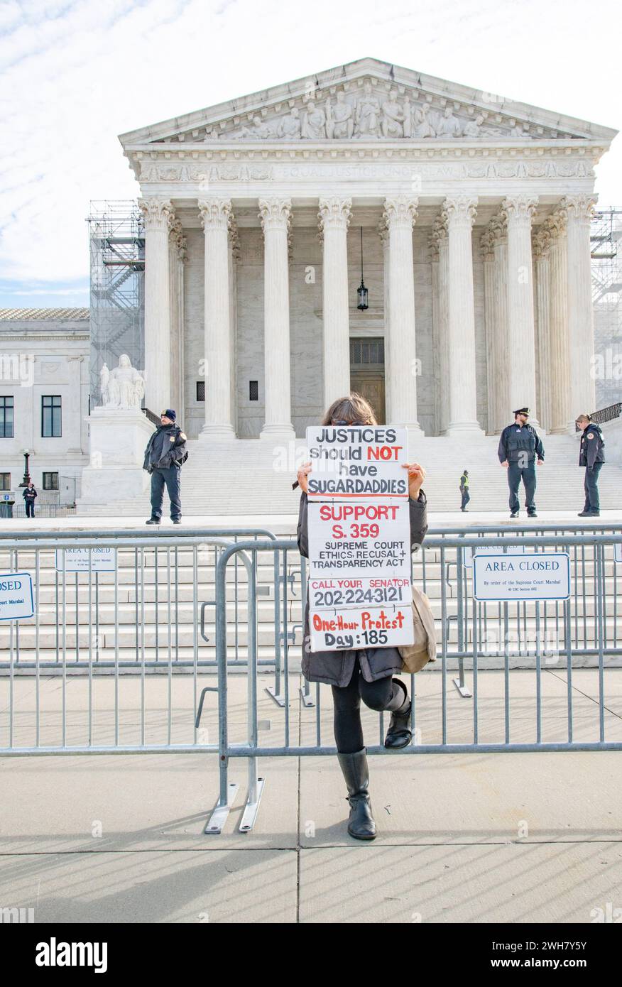 Washington DC, February 8,2024, USA:An Anti-Trump supporter stands outside  at the US Supreme Court in Washington DC while the Justices hear the case Stock Photo