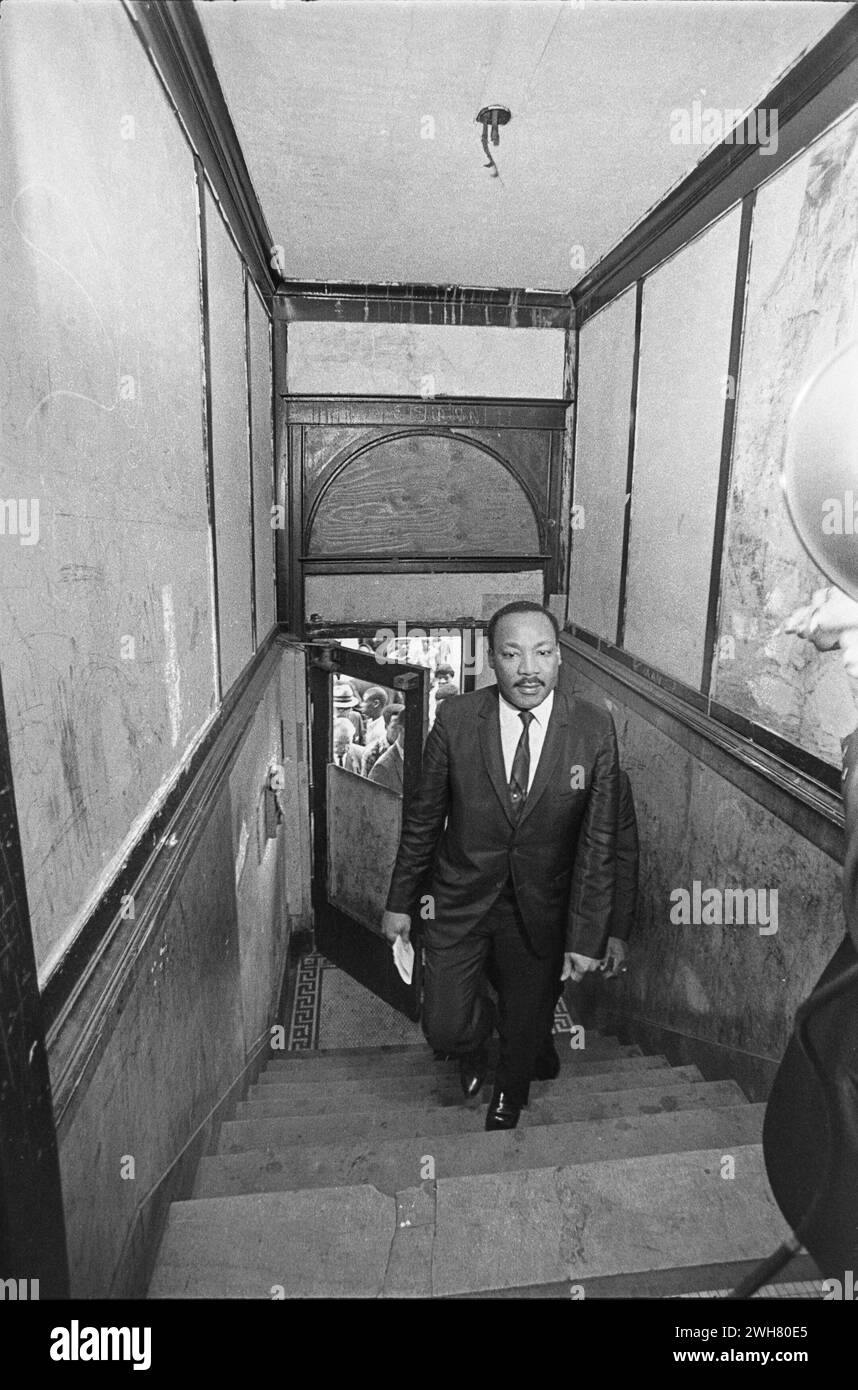 Dr. Martin Luther King Jr. Entering a Modest Apartment During Fair Housing Movement Chicago Stock Photo