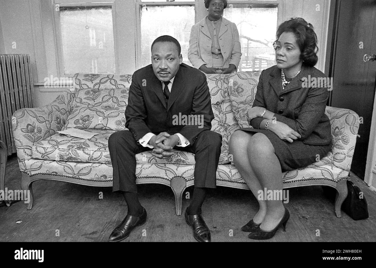 Dr. Martin Luther King Jr. Seated With Coretta Scott King in a Modest Living Room During Fair Housing Movement Stock Photo