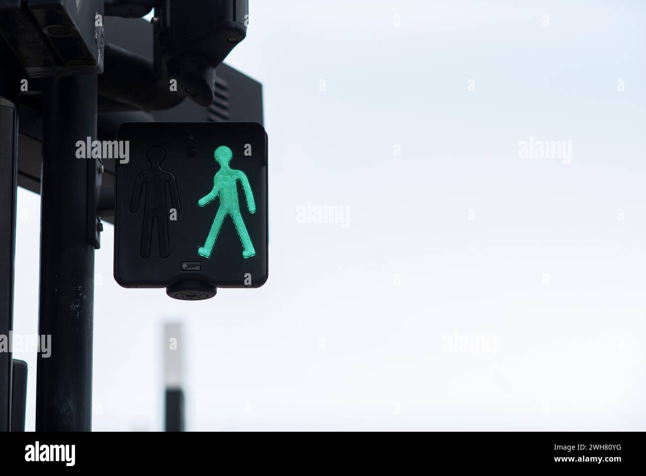 Green light at pedestrian traffic lights. Stock Photo