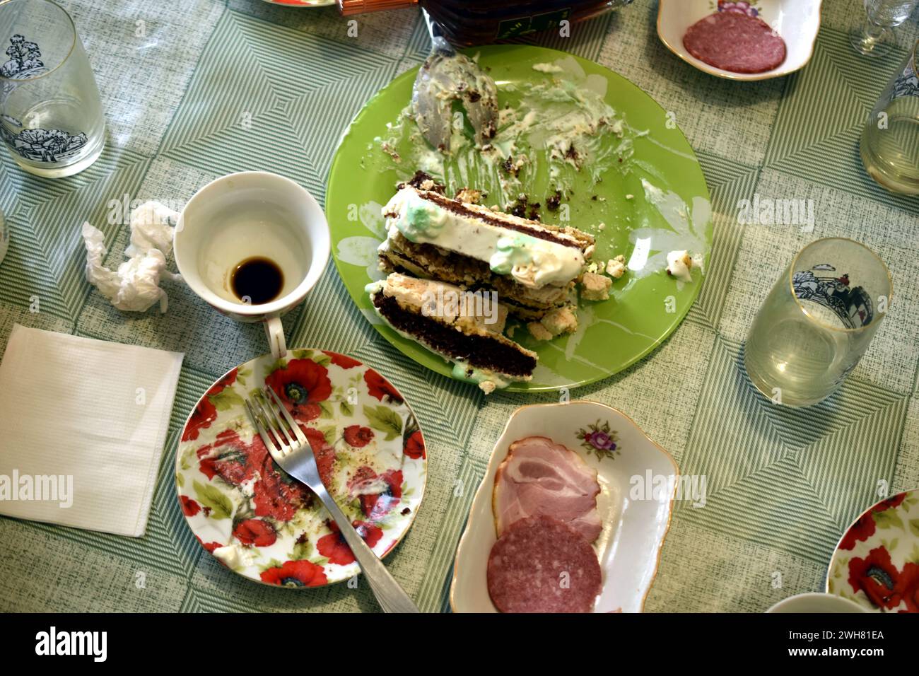 Top view of a table with dishes on which food was left after dinner. Stock Photo