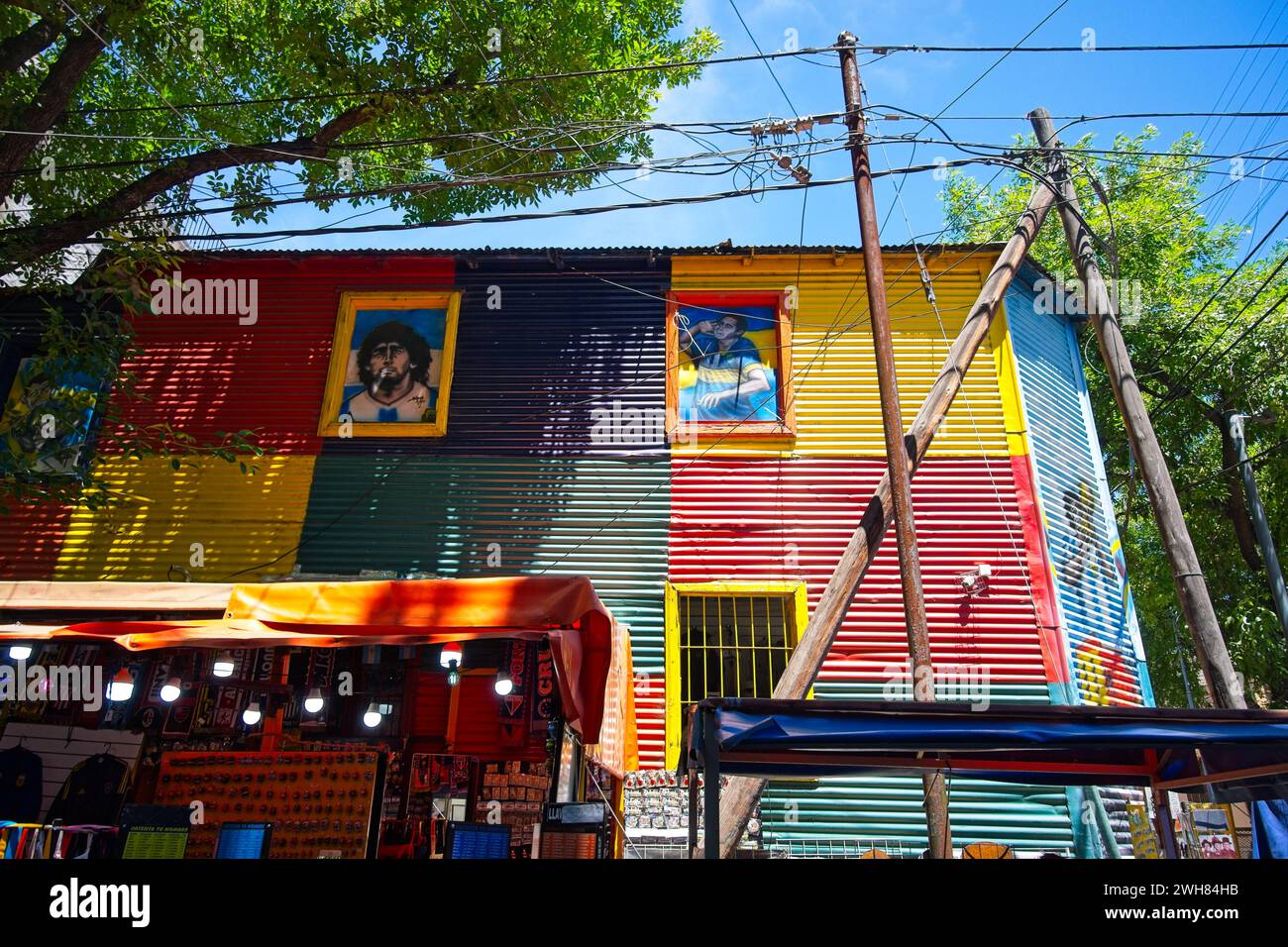 La Boca was largely abandoned untill in the 1950s when communal regeneration and local artist Benito Quinquela Martín began painting the tenements. Stock Photo