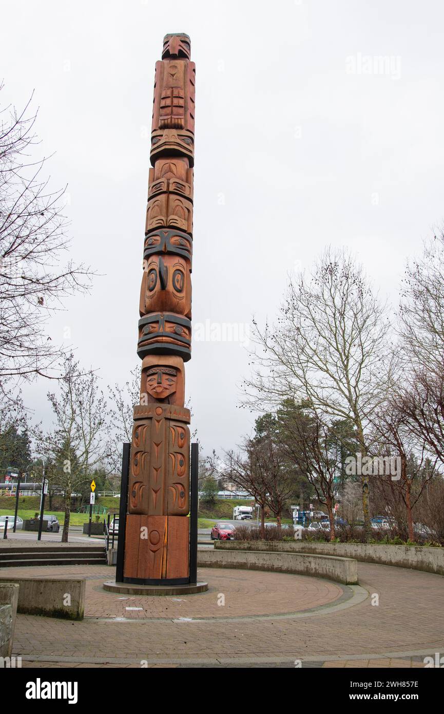 Salish totem pole at Maffeo Sutton Park in Nanaimo, British Columbia, Canada Stock Photo