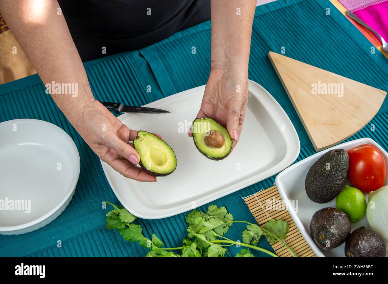 Hands Crafting Guacamole with Ripe Avocados. A series of images ...