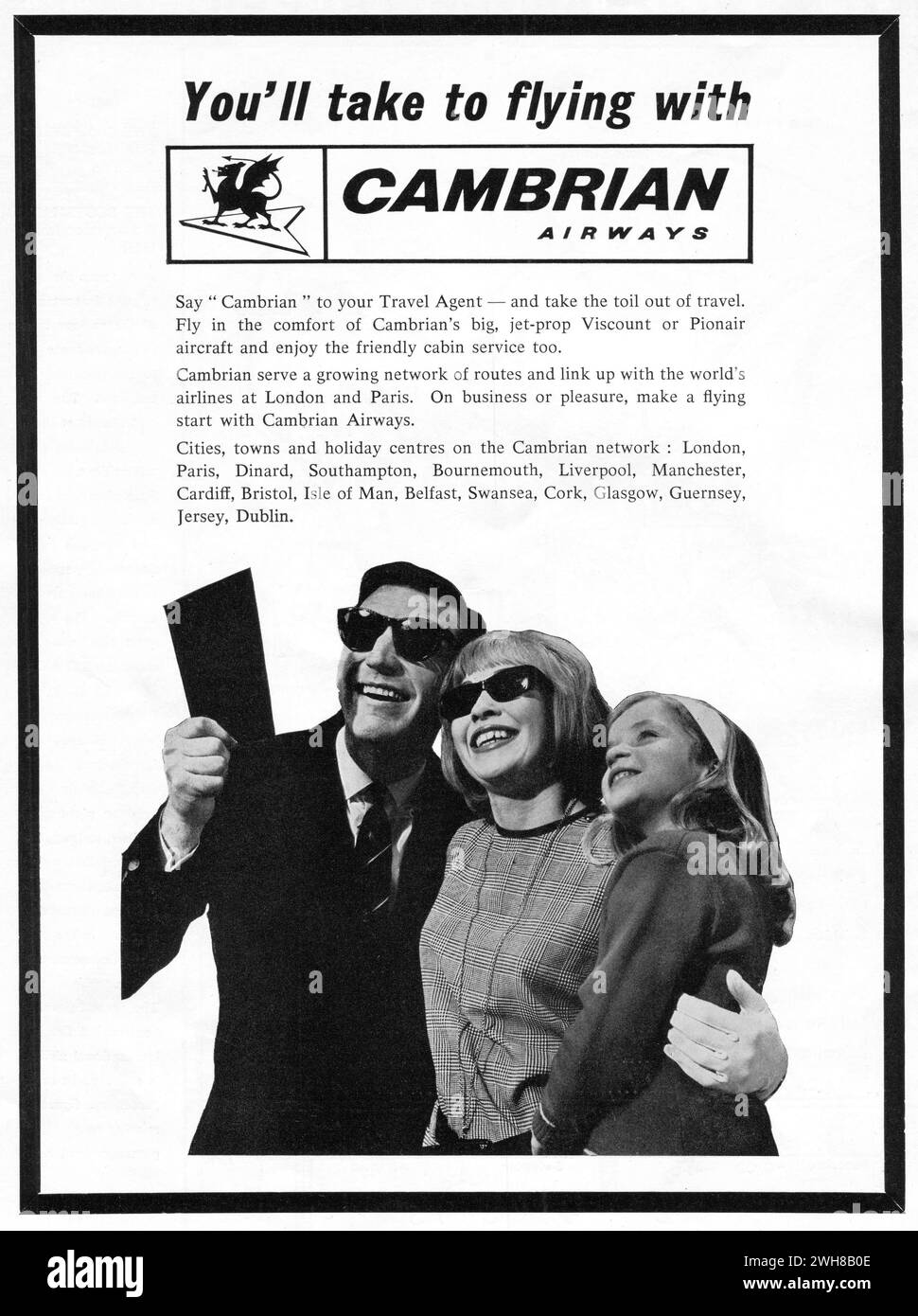 A 1964 advertisement promoting the British airline, Cambrian Airways, using the slogan, “You’ll take to flying with Cambrian Airways”. Cambrian ran operations from Cardiff Airport and Speke Airport (Liverpool John Lennon Airport) between 1935 and 1974. It was incorporated into British Airways on 1 April 1974 during the merger of BOAC, BEA, Cambrian and Northeast. Stock Photo