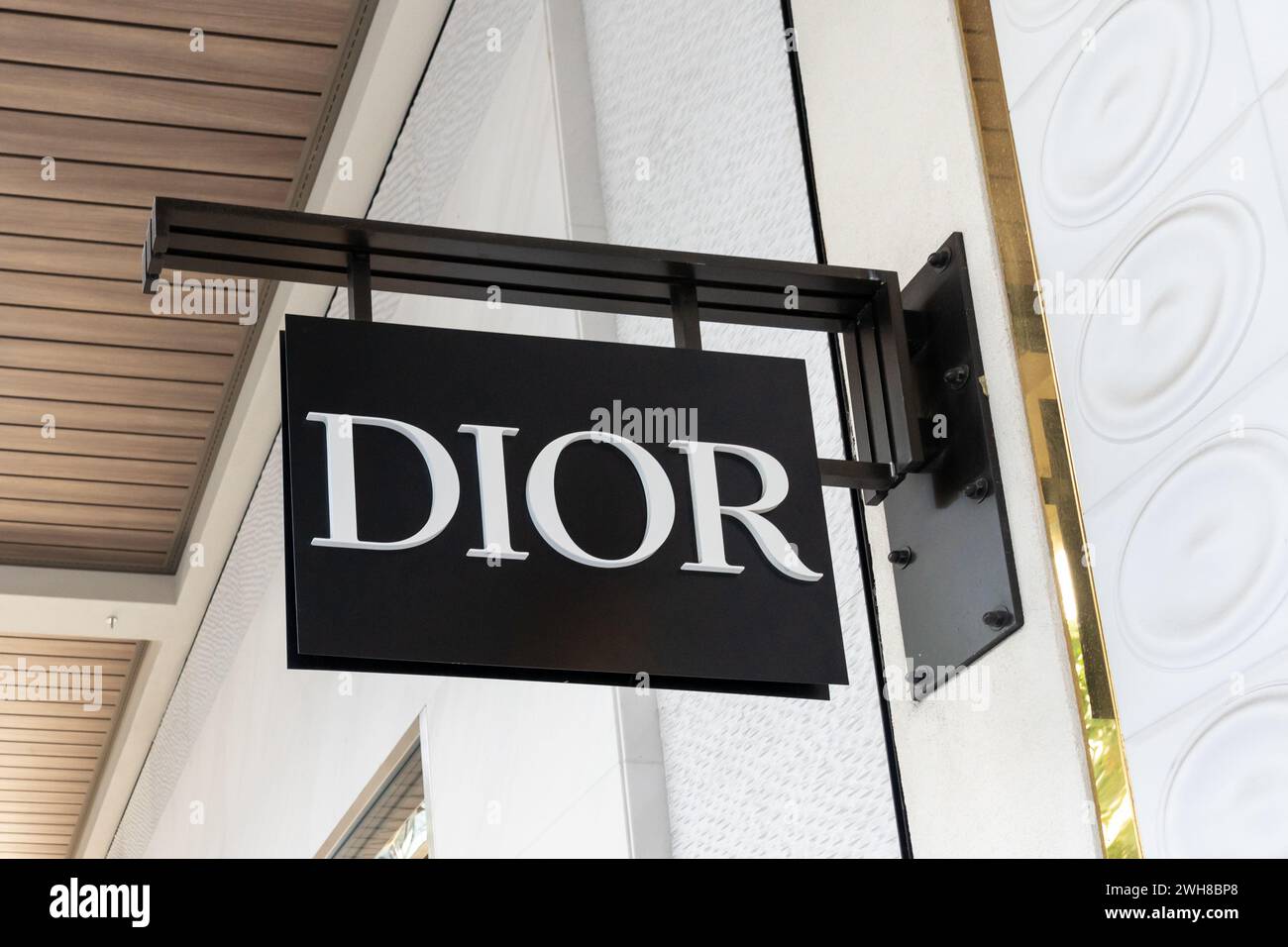 Dior logo hanging sign at their store in a shopping mall in Waikiki, Hawaii. Stock Photo