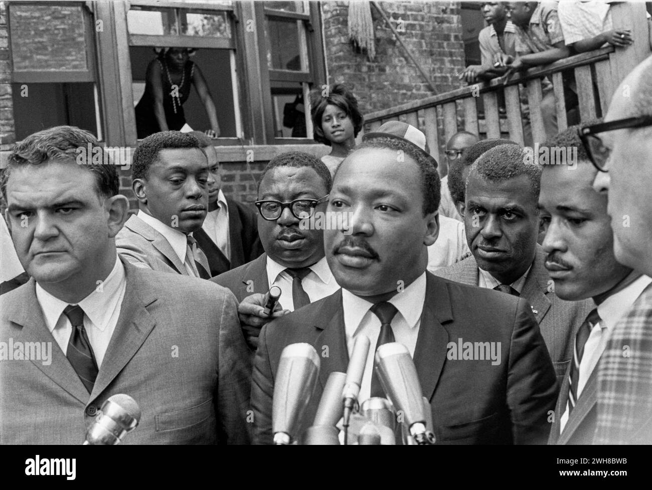 Dr Martin Luthur King and Civil Rights Leader Delivers a Speech Surrounded by Associates and Onlookers Stock Photo