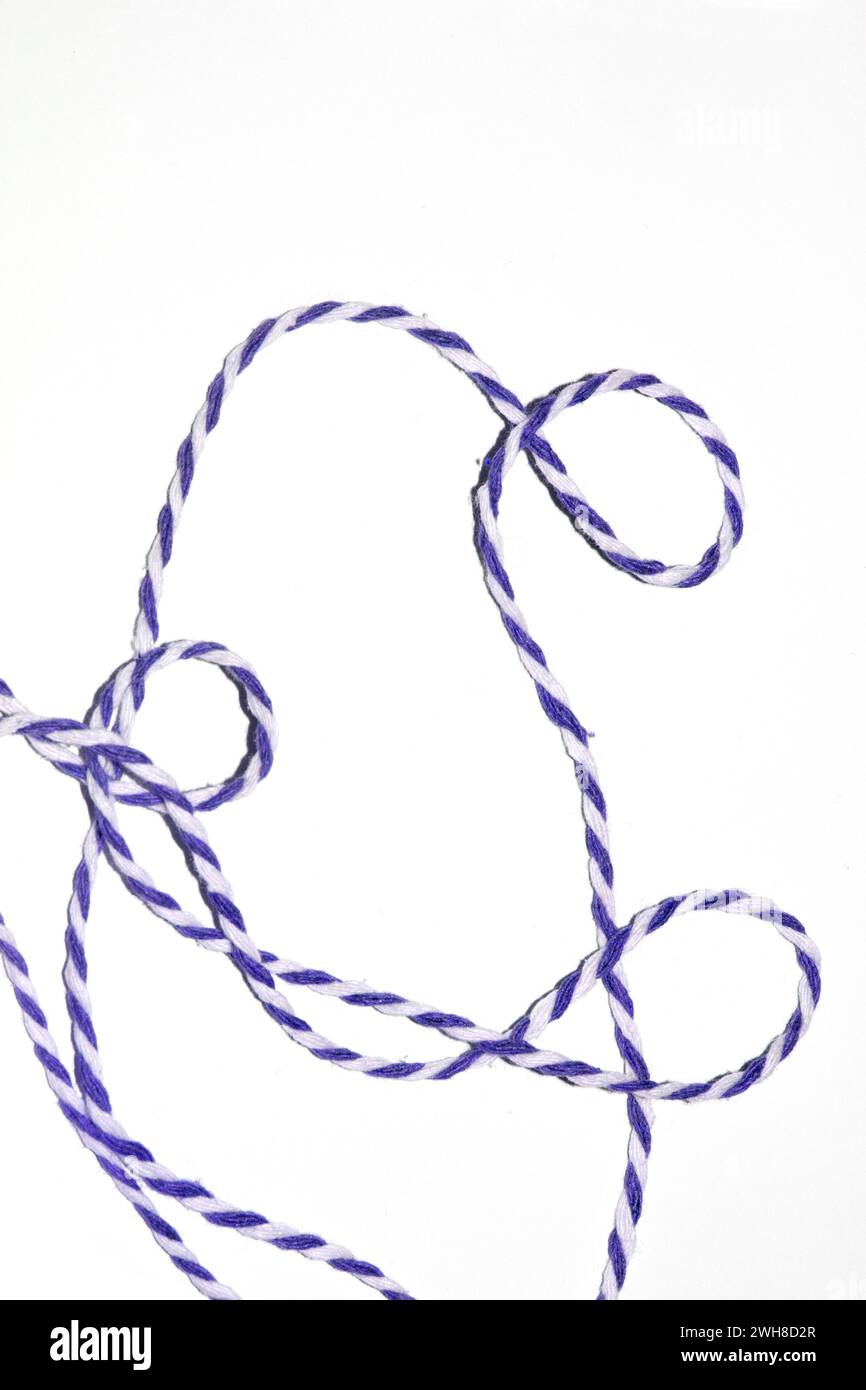 A Wrapping Paper Stripy String Rope Close Up on White Background Stock ...