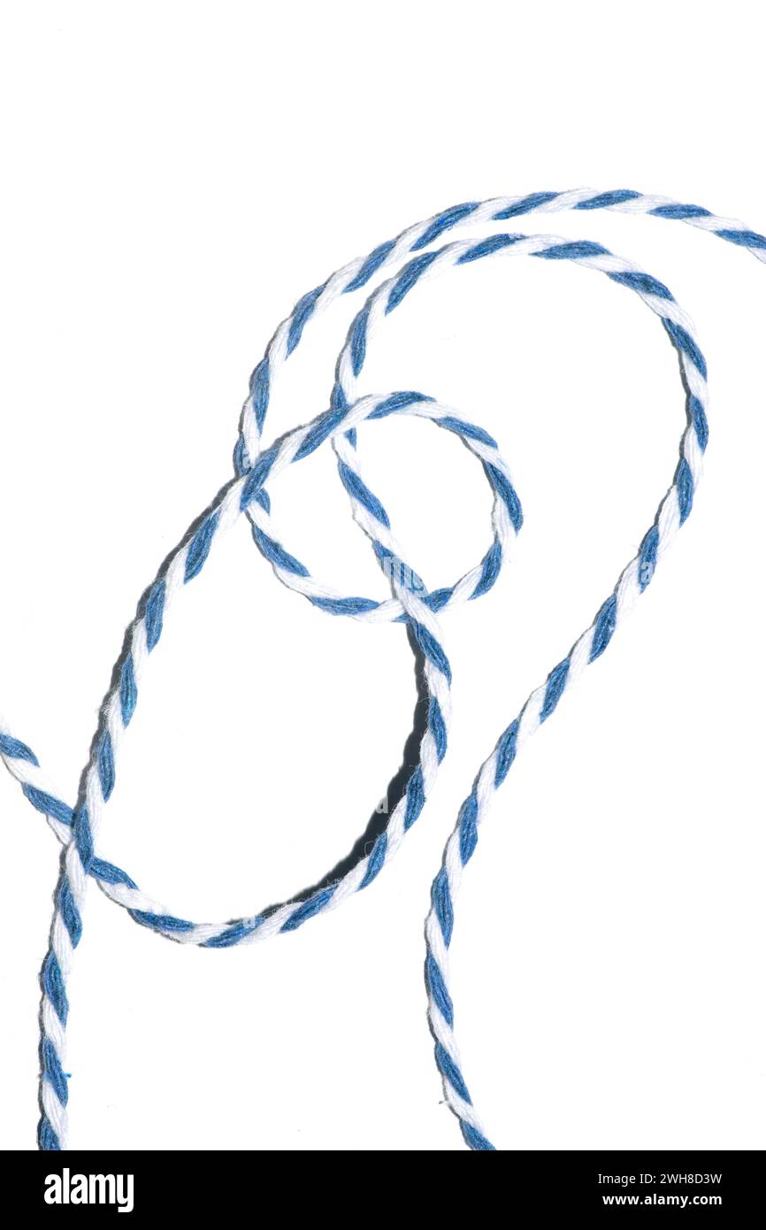 A Wrapping Paper Stripy String Rope Close Up on White Background Stock ...