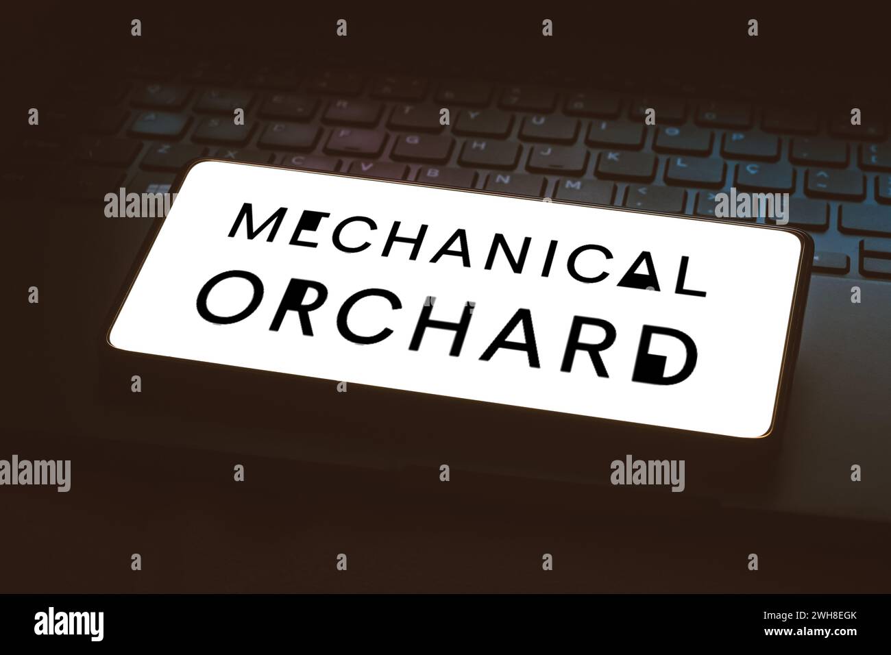 In this photo illustration, the Mechanical Orchard logo is displayed on