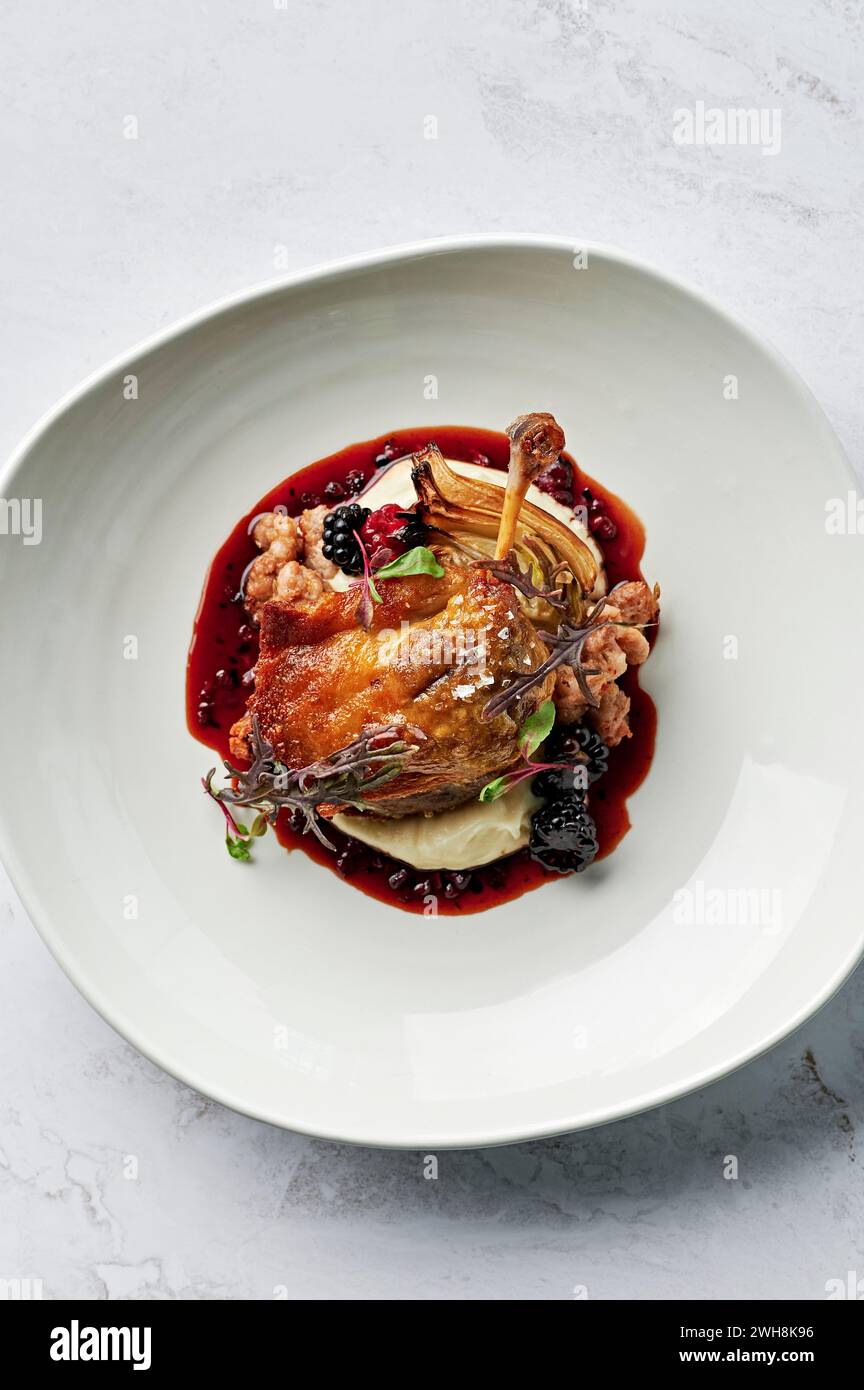 Roasted, confit duck leg, parsnip puree, spiced pork & fennel seed