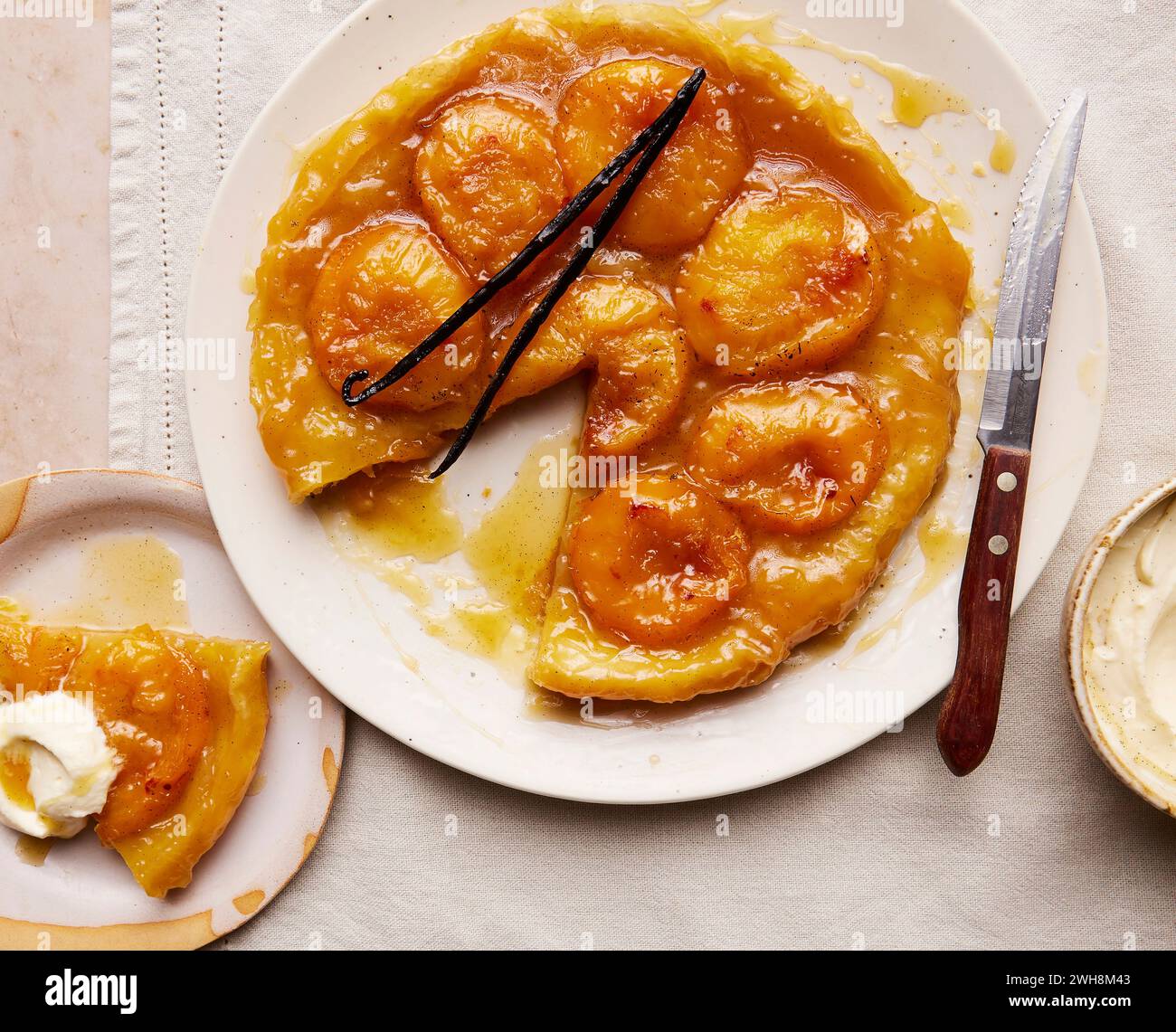 A plum tart tatin on a plate Stock Photo