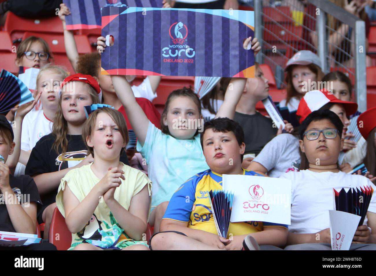 Young England Lionesses fans hold flags and clappers England v Northern Ireland UEFA Womens Euro 15 July 2022 St Marys Stadium Southampton Stock Photo