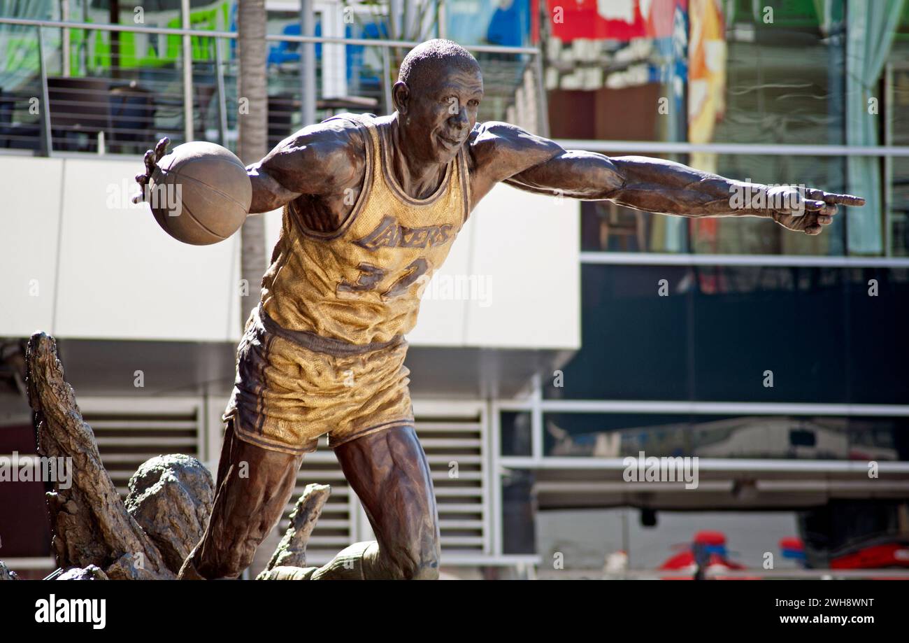 Statue of Laker great Magic Johnson outside the Crypto.com arena at L.A. Live in Downtown Los Angeles, CA Stock Photo