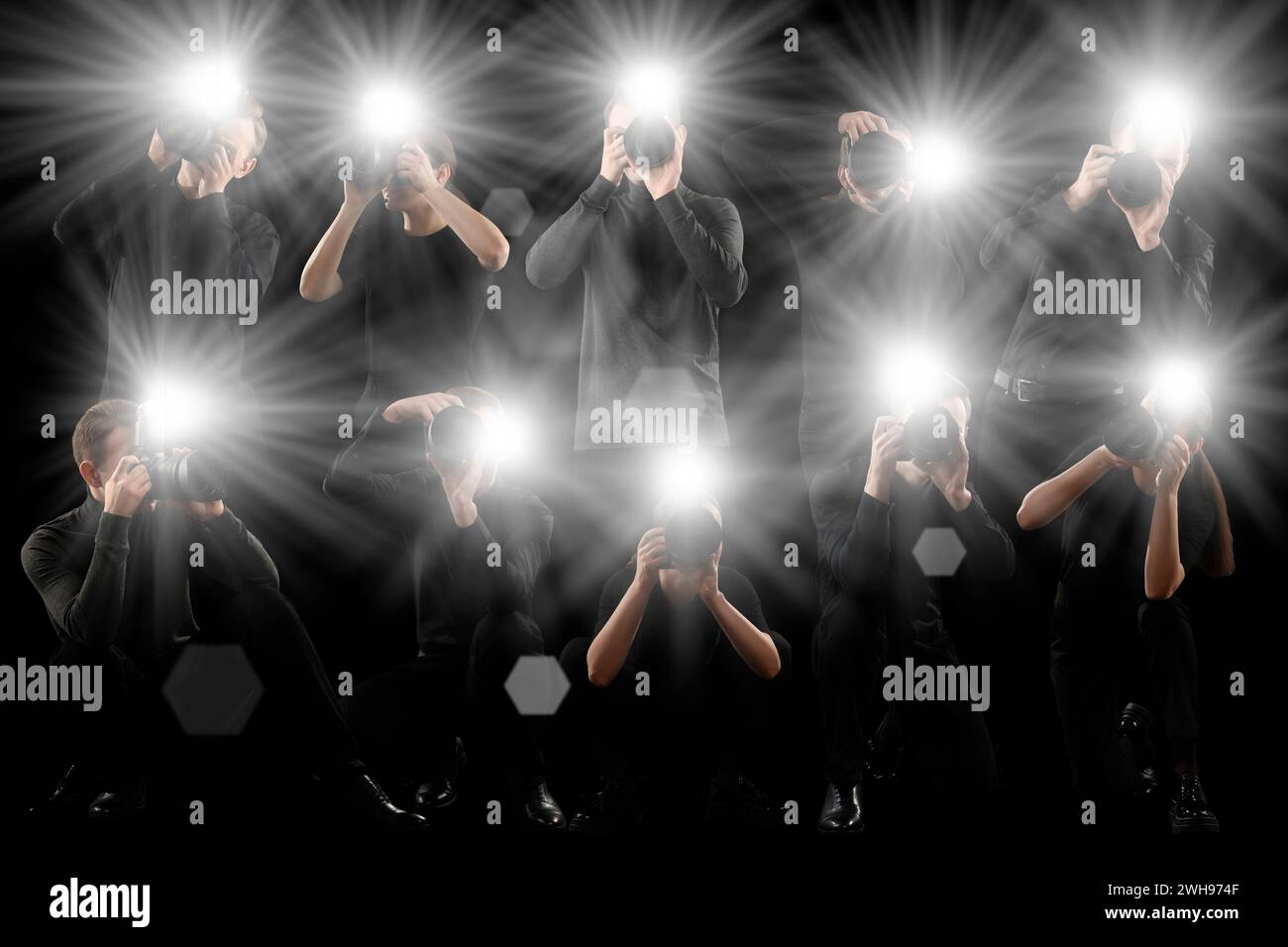 Group of photographers with cameras on black background. Paparazzi
