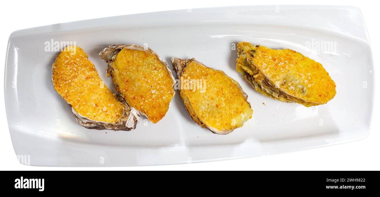 Oysters with cava sprinkled with salt. With glass of white wine Stock Photo