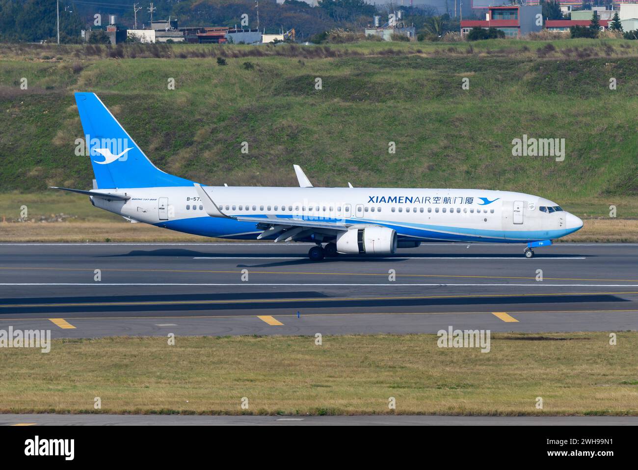 Xiamen Airlines Boeing 737 aircraft landing. Airplane Boeing 737-800 of XiamenAir, also know as Xiamen Air. Stock Photo
