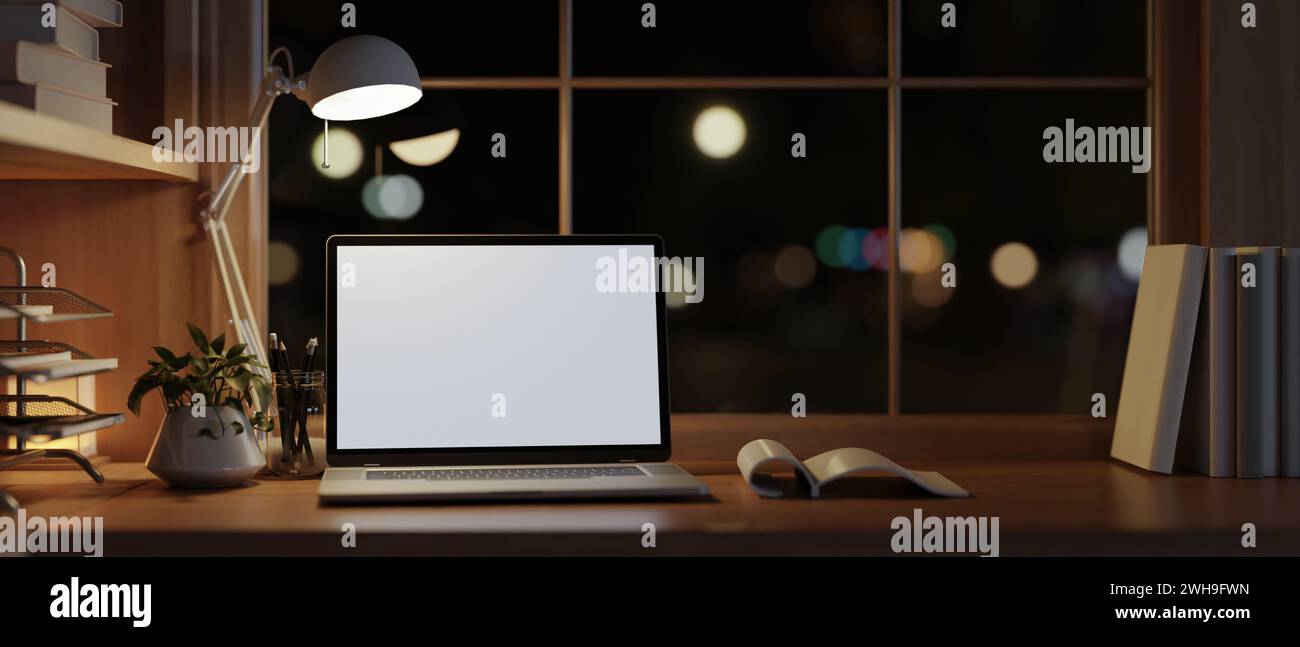 A modern and cozy home office workspace at night with a white-screen ...
