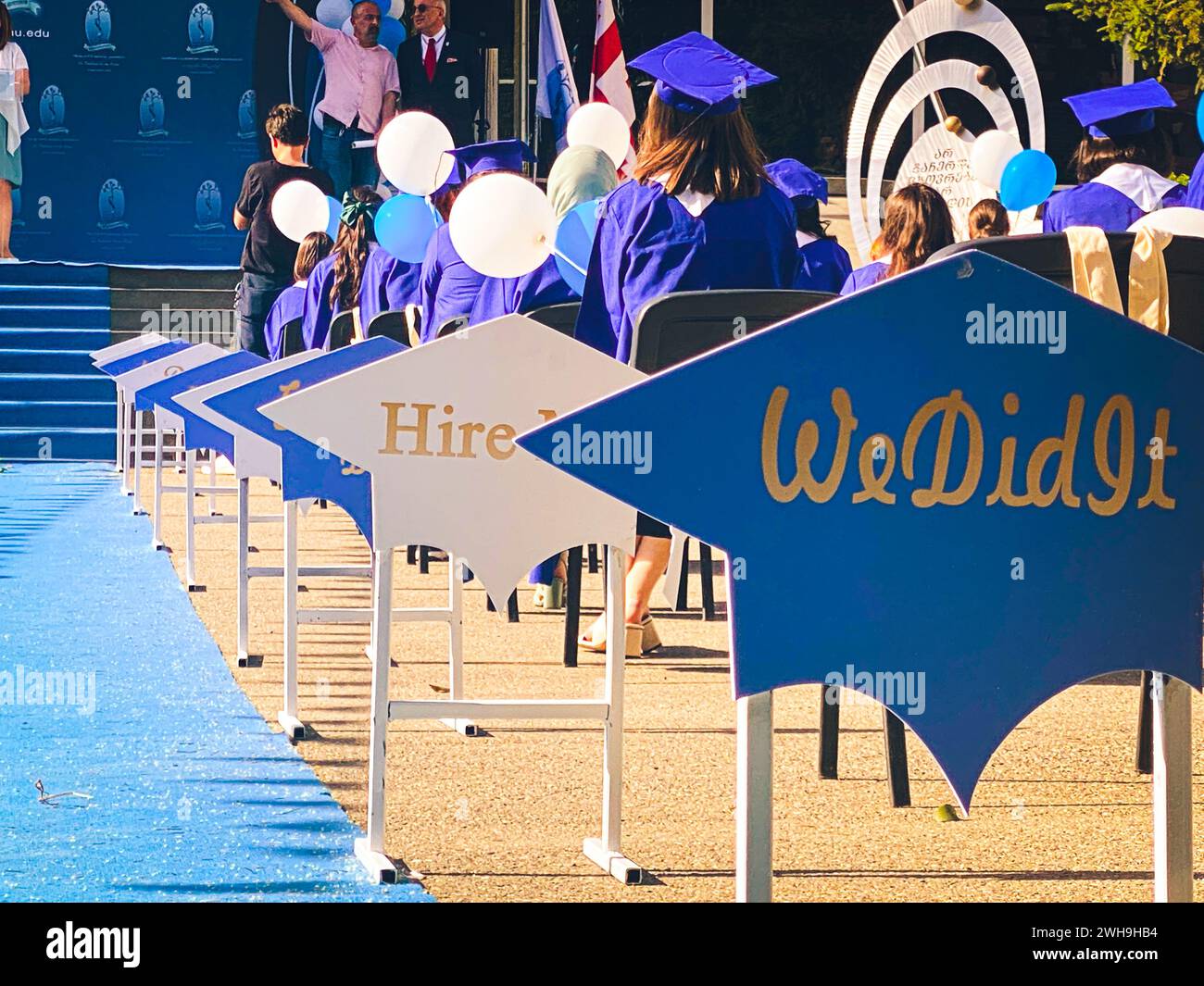 Tbilisi, Georgia - 14th july, 2022: Gardueates sit on ceremony.Tbilisi state medical university graduation event. Popular study university in caucasus Stock Photo